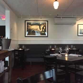 The Carriage House - The decor is mostly revamped. White paint covers the old wood panelling. The booths are pretty much gone. - New American Near Me - Rye, New Hampshire The Carriage House - The decor is mostly revamped. White paint covers the old wood panelling. The booths are pretty much gone. - New American Near Me - Rye, New Hampshire
