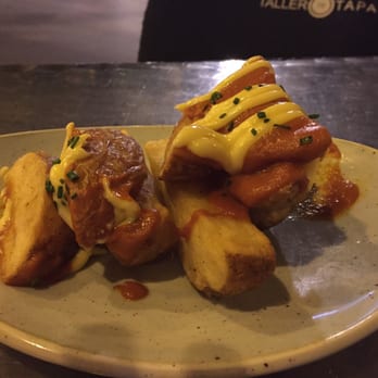 Taller de Tapas - Patates braves which were full of flavor, they were covered with a smoked paprika sauce. - Spanish Near Me - Barcelona, B Taller de Tapas - Patates braves which were full of flavor, they were covered with a smoked paprika sauce. - Spanish Near Me - Barcelona, B