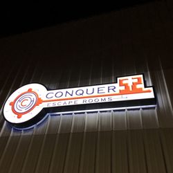 Conquer Escape Rooms - Sign