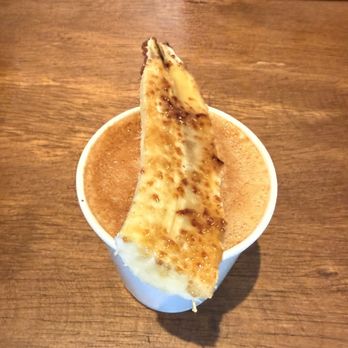 Olivia Coffee & Flower - Banana milk latte, bird's-eye view - Florists Near Me - Oakland, California Olivia Coffee & Flower - Banana milk latte, bird's-eye view - Florists Near Me - Oakland, California
