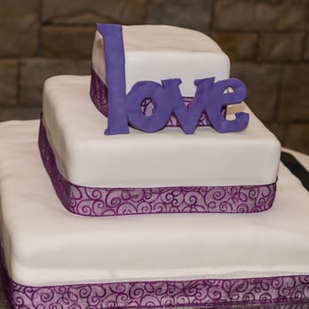La Ferme - A lovely, dark chocolate, marzipan wedding cake, lovingly created by La Ferme. - French Near Me - Chevy Chase, Maryland La Ferme - A lovely, dark chocolate, marzipan wedding cake, lovingly created by La Ferme. - French Near Me - Chevy Chase, Maryland