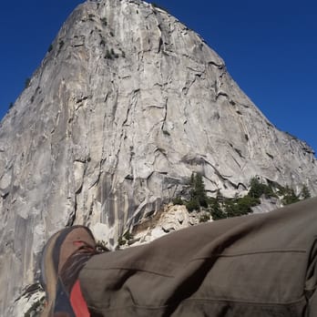 YExplore Yosemite Adventures - Laying down at the top of Nevada Falls. Priceless! - Tours Near Me