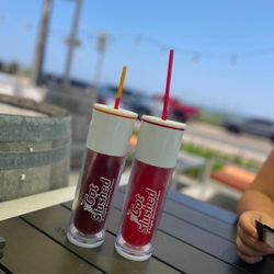 Flagler Beachfront Winery - Refillable slushy tumblers on the patio