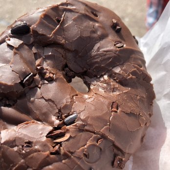 Dough - Closeup of chocolate donut with cocoa nibs - Desserts Near Me - New York, New York