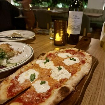 Grand Public - Margharita Flatbread, Bottle of Sangiovese in the background - American Near Me - Miami, Florida
