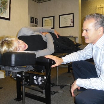 Madeira Chiropractic Wellness Center - Dr. John explaining that chiropractic care should never be painful - Chiropractors Near Me - Hershey, Pennsylvania Madeira Chiropractic Wellness Center - Dr. John explaining that chiropractic care should never be painful - Chiropractors Near Me - Hershey, Pennsylvania