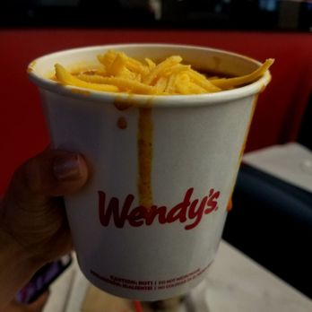 Wendy's - a hand holding a cup of fries - Burgers Near Me - Upland, California Wendy's - a hand holding a cup of fries - Burgers Near Me - Upland, California