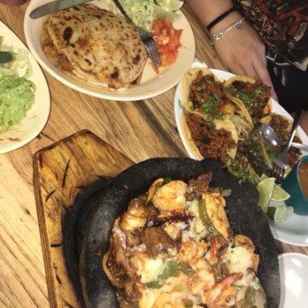 Taqueria Los Agaves - several plates of food on a table - Mexican Near Me - Pasadena, Texas Taqueria Los Agaves - several plates of food on a table - Mexican Near Me - Pasadena, Texas