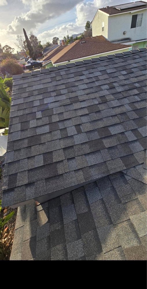 Slide of Vigil's Roofing