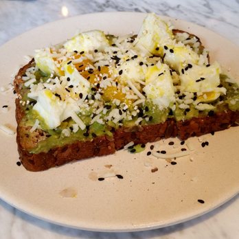 Flower Child - Avocado toast ($7). Probably one of the best avocado toasts I've had because of the soft egg. - Salad Near Me - Houston, Texas Flower Child - Avocado toast ($7). Probably one of the best avocado toasts I've had because of the soft egg. - Salad Near Me - Houston, Texas