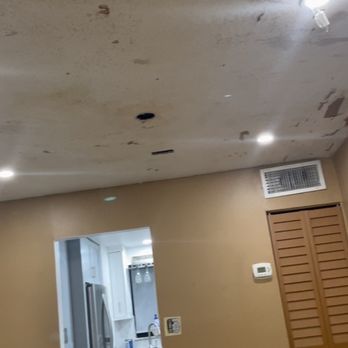 JT Express Solutions - Old popcorn ceiling disaster and gross wall color - Flooring Near Me