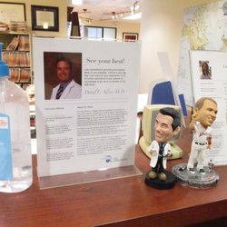 Daniel C Kline, MD - Dr. Kline with sports art
