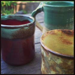 Closeup of our three beautiful new mugs from Calistoga Pottery.