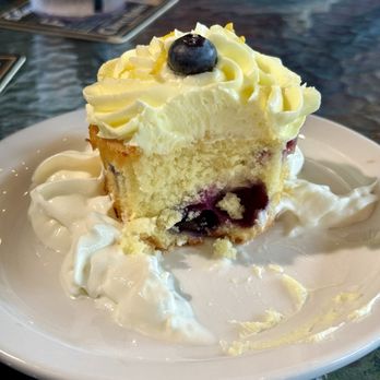 Shenanigans - Lemon blueberry cupcake, with lemon buttercream frosting. - Irish Near Me - Dahlonega, Georgia Shenanigans - Lemon blueberry cupcake, with lemon buttercream frosting. - Irish Near Me - Dahlonega, Georgia