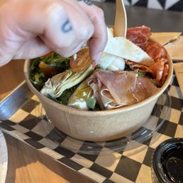 Already dipping into the Italian salad.