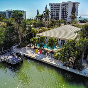 Precise Realty - The outdoor living in our Lido Key (St. Armand's) vacation rentals is truly amazing - Call us! - Real Estate Services Near Me - Sarasota, Florida