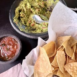 Cabo Seafood Grill & Cantina - Table guac with chips and salsa. July 2026