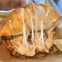 Rusty Taco - Birria cheese pull