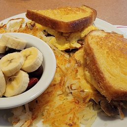The Grand Slamwich with a side of seasonal fruit: A tasty and filling breakfast to start the day! The Grand Slamwich with a side of seasonal fruit: A tasty and filling breakfast to start the day!