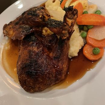 The Parisian Restaurant & Wine Bar - The crispy half duck with orange sauce was tantalizing good with pomme puree. - French Near Me - Jupiter, Florida The Parisian Restaurant & Wine Bar - The crispy half duck with orange sauce was tantalizing good with pomme puree. - French Near Me - Jupiter, Florida