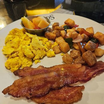 Firebirds Wood Fired Grill - Bacon and eggs breakfast (missing biscuit) fruit not fresh - Seafood Near Me - Chandler, Arizona Firebirds Wood Fired Grill - Bacon and eggs breakfast (missing biscuit) fruit not fresh - Seafood Near Me - Chandler, Arizona