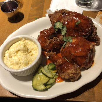 Tupelo Honey - Sweet and spicy chicken with the goat cheese grits. - Southern Near Me - Franklin, Tennessee Tupelo Honey - Sweet and spicy chicken with the goat cheese grits. - Southern Near Me - Franklin, Tennessee