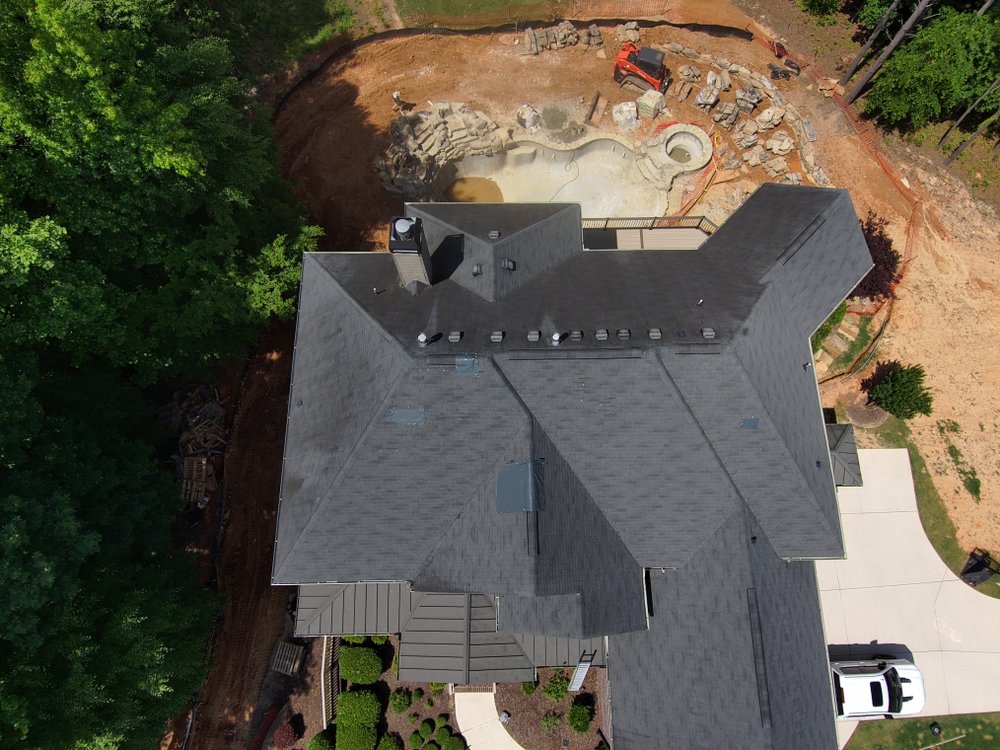 Slide of Cumming Roofing Company