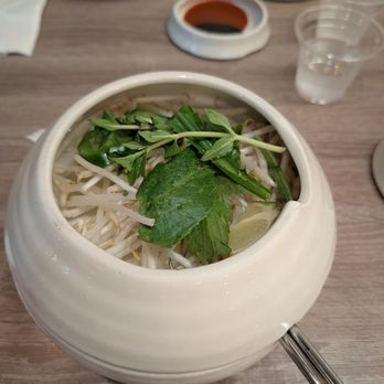 Pho Flavor - Sauce at the top, bean sprouts in the middle, main bowl of noodles on the bottom - Vietnamese Near Me - Garden Grove, California Pho Flavor - Sauce at the top, bean sprouts in the middle, main bowl of noodles on the bottom - Vietnamese Near Me - Garden Grove, California