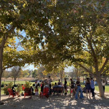 Riverstar Vineyards - a group of people sitting under trees - Wineries Near Me - San Miguel, California Riverstar Vineyards - a group of people sitting under trees - Wineries Near Me - San Miguel, California