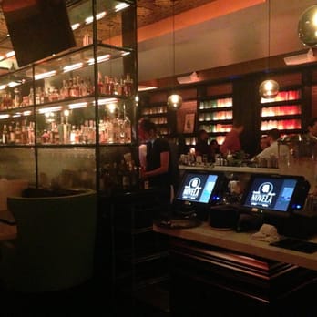 Novela - Peering at the bar - Cocktail Bars Near Me - San Francisco, California Novela - Peering at the bar - Cocktail Bars Near Me - San Francisco, California