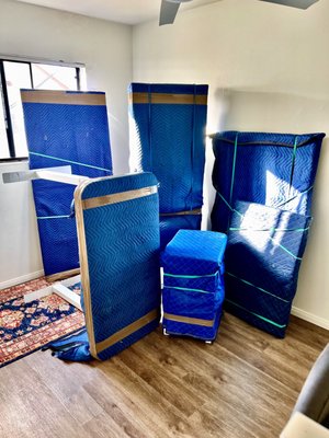 Local Moving & Packing - Just Move It San Diego, value your items and approach the packing of larger, more cumbersome items by wrapping furniture with precision and care. Sofas, tables, and chairs are enveloped in thick moving blankets and secured. sometimes the process of disassembling larger items is required, so each component is being wrapped separately to ensure that no part is left exposed. Local Moving & Packing - Just Move It San Diego, value your items and approach the packing of larger, more cumbersome items by wrapping furniture with precision and care. Sofas, tables, and chairs are enveloped in thick moving blankets and secured. sometimes the process of disassembling larger items is required, so each component is being wrapped separately to ensure that no part is left exposed.
