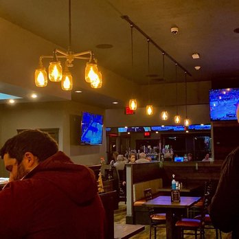 The Marsh Coal Fired Pizza - bar area, seating, televisions, lighting, order arrangement - Sports Bars Near Me - Marshfield, Massachusetts The Marsh Coal Fired Pizza - bar area, seating, televisions, lighting, order arrangement - Sports Bars Near Me - Marshfield, Massachusetts