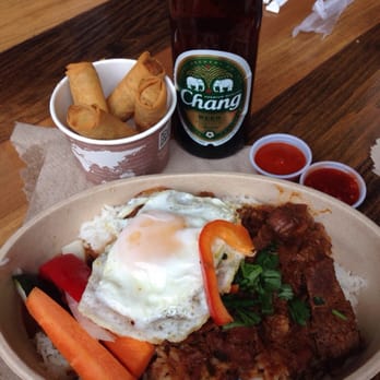 Crushcraft Thai Eats - Thai red curry with a fried egg on top. Chang beer ($2 Tuesday's!) and egg rolls. - Thai Near Me - Dallas, Texas