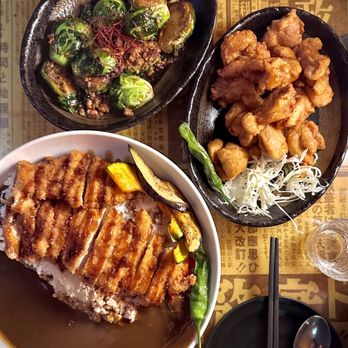 Yuchan Shokudo - Clockwise: BRUSSELS GARLIC SAUTÉ, CHICKEN KARA-AGE, CHICKEN KATSU CURRY PLATTER - Ramen Near Me - Davis, California Yuchan Shokudo - Clockwise: BRUSSELS GARLIC SAUTÉ, CHICKEN KARA-AGE, CHICKEN KATSU CURRY PLATTER - Ramen Near Me - Davis, California