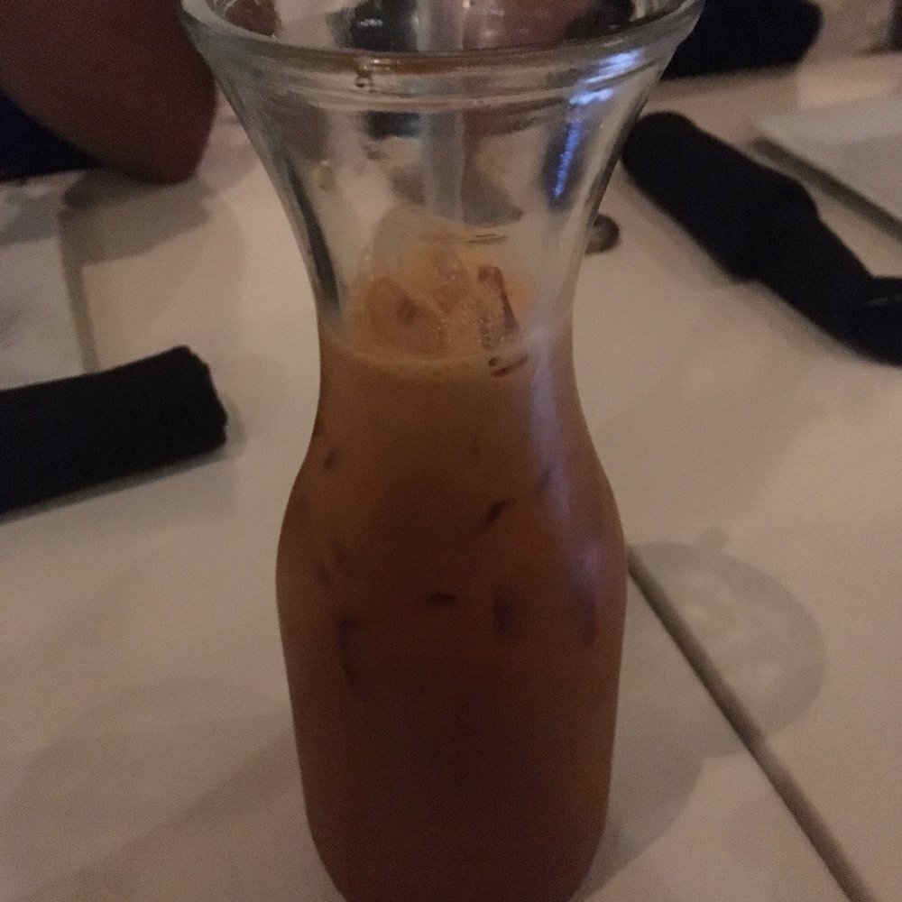 Silom 12 - Thai iced tea with less ice. Cost $4.20 even though the menu says $4. - Thai Near Me - Chicago, Illinois Silom 12 - Thai iced tea with less ice. Cost $4.20 even though the menu says $4. - Thai Near Me - Chicago, Illinois