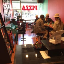 The Strait Slice Pizza - There's a great hand painted piano and record player for the customers to use.