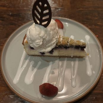 Brighton Bodega - BLUEBERRY CRUMBLE LEMON CHEESECAKE - Cocktail Bars Near Me - Brighton, Massachusetts