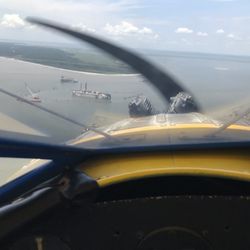 Coastal Biplane Tours - View of the 'Golden Ray' shipwreck from the air