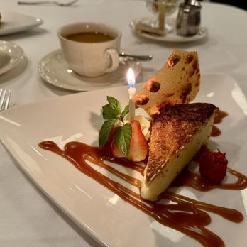 Alexander's - Cheesecake with anniversary candle. - New American Near Me - Roanoke, Virginia