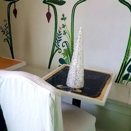 a white chair and a table
