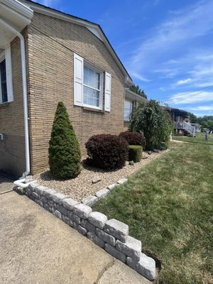 Landscaping with Retaining wall - Call now for a free estimate!