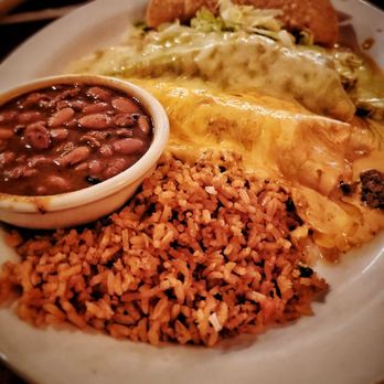 Uncle Julio's - Tex-Mex Combination Dinner - Beef enchilada with agave queso sauce, chicken enchilada with creamy hatch chile sauce and one crispy beef taco - Tex-Mex Near Me - Arlington, Virginia