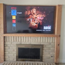 My fireplace with the new 85" TV. My fireplace with the new 85" TV.