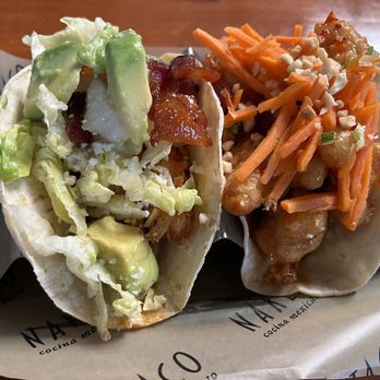 Naked Taco - Lobster taco with bacon on left. Cauliflower taco on the right - Cocktail Bars Near Me - Miami, Florida