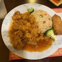 Jin's Asian Cuisine - Orange chicken combo with pork fried rice and an egg roll