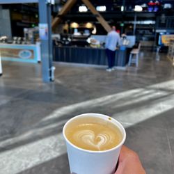 Nomad Coffee House - Latte, with views of the shop