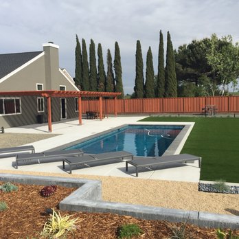 Holy Waters Pool and Spa - Luna Quartz - Aruba with Basalt Coping - General Contractors Near Me