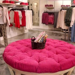Cabi Factory Store - Great seating!  Look at those cute pants off to the left.  Store is very neat.