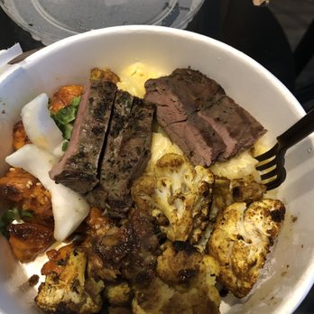 Flower Child - 3 sides + Protein (Indian Spiced Cauliflower, Red Chile Glazed Sweet Potato, Gluten-Free Mac & Cheese, Grass-Fed Steak*) - Salad Near Me - Houston, Texas Flower Child - 3 sides + Protein (Indian Spiced Cauliflower, Red Chile Glazed Sweet Potato, Gluten-Free Mac & Cheese, Grass-Fed Steak*) - Salad Near Me - Houston, Texas