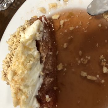 Lale Lokantası - Oven baked quince in thick syrup with cream - Turkish Near Me - Istanbul, 34 Lale Lokantası - Oven baked quince in thick syrup with cream - Turkish Near Me - Istanbul, 34